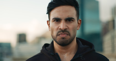 Image showing Workout sweat, city portrait and man serious, determined and ready for outdoor cardio, fitness or sports performance. Face, active and angry athlete, runner or person for exercise training routine