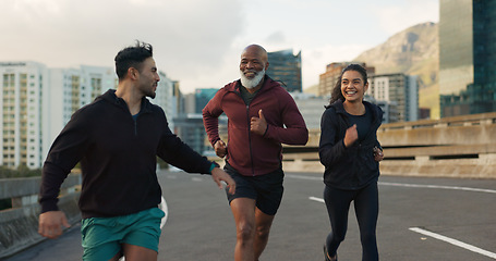 Image showing Runner group, friends and city on road with talking, progress and happy for fitness, health and wellness. Men, woman and conversation on metro street for workout, training and exercise in Cape Town
