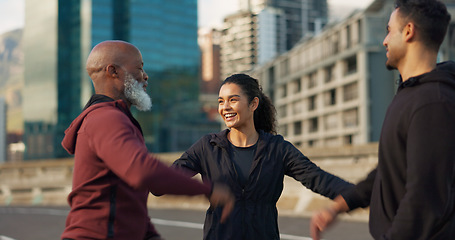 Image showing Runner group, friends and city with talking on road, progress and support for fitness, health and wellness. Men, woman and motivation on metro street for workout, training and exercise in Cape Town