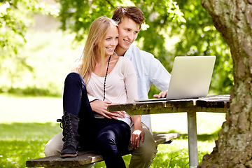 Image showing Park, laptop or relax couple smile, reading or watch online movie, social network post or video in natural nature garden. Bench chair, computer or spring wellness man, woman or people streaming media