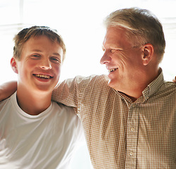 Image showing Grandfather, teenager and hug with smile, happy and embrace with love, grandchild and home. Grandparent, support or bonding together for relationship, family or retired with boy, house or senior man