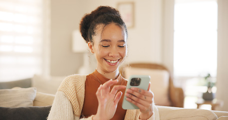 Image showing Young woman, phone and laugh on sofa, thinking and relax in home living room for texting, web chat or blog. Girl, excited smile and smartphone with click, meme or social network app on lounge couch