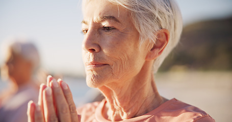 Image showing Beach yoga class, face or senior woman doing exercise, wellness breathing and learning mindfulness workout in nature. Freedom, relax or elderly person pose, morning fitness and coach teaching pilates