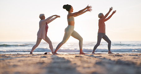 Image showing Beach yoga class, sunset and meditation coach teaching breathing, mindfulness and spiritual chakra, aura or soul healing. Ocean waves, relax yogi and personal trainer coaching learning pilates group