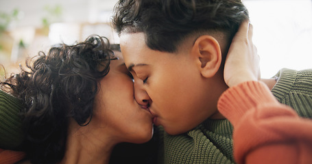 Image showing Love, home face and lesbian couple kiss, intimate and care for marriage, non binary or transgender partner on lounge sofa. LGBT, trust and same sex people bonding, support and enjoy time together