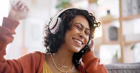 Image showing Home, smile and woman with headphones, music and dance with audio, streaming sounds and songs. Person on a couch, girl and lady with headset, energy and radio with freedom, motivation and happiness