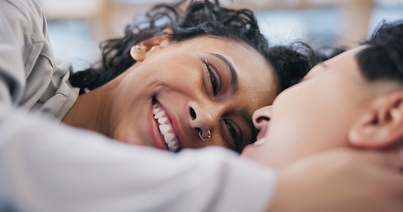 Image showing Love, lgbt couple smile and hug with happy eyes for love, connection and commitment inside apartment. Lesbian, women and happiness with trust and touch for communication in relationship on sofa