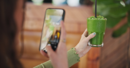 Image showing Phone screen, photography and green juice for diet, woman or glass in cafe for social network app. Influencer girl, smartphone and smoothie in post, update and web blog for nutrition, detox or health