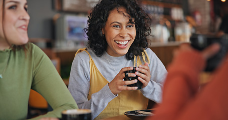 Image showing Happy, talking and friends with coffee at a restaurant for communication, conversation or bonding. Smile, together and women or young people at a cafe for tea, drink or speaking on the weekend
