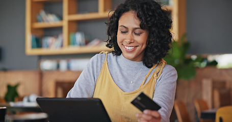 Image showing Tablet, credit card and woman in coffee shop, online and payment in restaurant. Technology, plastic money and happy person in cafe in ecommerce, digital fintech and typing on financial banking app