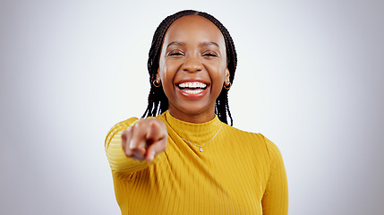 Image showing Happy, portrait and black woman with hand pointing at you in studio for choice, vote or decision on grey background. Recruitment, opportunity and face of female model with emoji finger for job offer