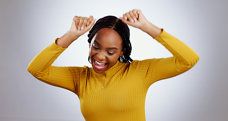 Image showing Dance, celebration and happy black woman in studio with freedom, feel good or music on grey background. Energy, moving and excited African female model with rhythm for radio, news or deal success