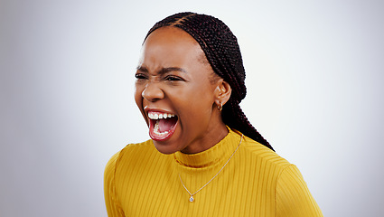 Image showing Angry, scream and frustrated face of black woman shout and yelling in studio white background. Crisis, stress and person voice anger, rage or crazy emoji with problem, mistake or annoyed with fail