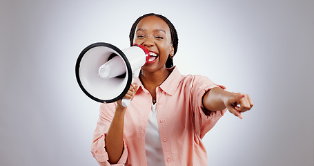 Image showing Woman, megaphone and winner choice in announcement, broadcast or join us for opportunity on a white background. Portrait of African person pointing you for competition, bonus and winning in studio