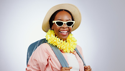 Image showing Portrait, glasses and black woman with vacation, travel and happiness on a white studio background. Face, African person and model with eyewear, hat and backpack with holiday, weekend trip or getaway