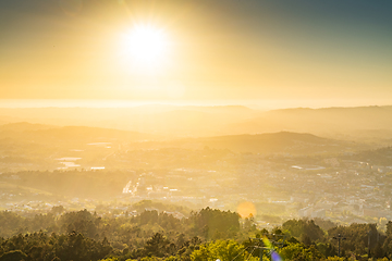Image showing Sunset with sun rays over the Guimaraes