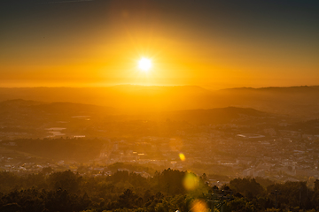 Image showing Sunset with sun rays over the Guimaraes
