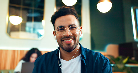 Image showing Man, portrait and smile with video call in cafe for relax, remote work or networking with earphones in morning. Person, face and listening to music for peace, coffee break or happiness in restaurant