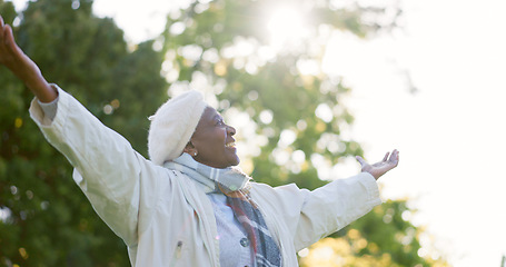 Image showing Freedom, nature and happy senior woman in a park for breathing, celebration or travel adventure. Retirement, energy and African female person in a forest with gratitude for life, peace and fresh air