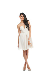 Image showing Portrait, fashion and happy woman in white dress in studio isolated on a background mockup. Smile, model and person in formal clothes, elegant and trendy style for party, prom or event on a backdrop