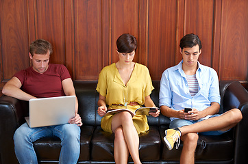 Image showing Waiting room, hiring or business people in line for a job interview with magazine or cellphone. Laptop, technology or creative designers in queue ready for meeting, recruitment or vacancy opportunity