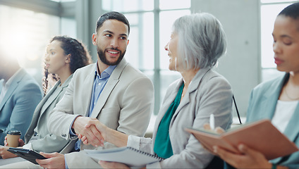 Image showing Happy business people, handshake and meeting in seminar greeting, introduction or teamwork at office. Businessman shaking hands with woman in staff training, team workshop or recruiting at workplace