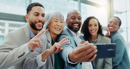 Image showing Happy business people, peace sign and office selfie for photography, team building or social media. Group of corporate employees smile with emoji for teamwork, photograph or fun picture at workplace