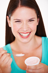 Image showing Woman, eating and portrait with yogurt or healthy food, diet or nutrition in studio with happiness. Happy, face and girl with spoon, yoghurt and strawberry flavor of dairy, product or snack for lunch