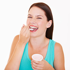 Image showing Eating, yogurt and portrait of woman with healthy food, diet or nutrition in studio with happiness. Happy, face and girl with spoon, yoghurt or strawberry flavor of dairy, product or breakfast snack