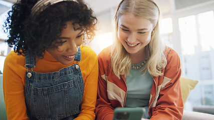 Image showing Phone, friends and wow of women in home living room streaming on internet. Smartphone, happy girls and surprise on social media, video and interracial bonding on website together to smile on sofa.