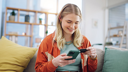 Image showing Woman, credit card and phone for online shopping in home with digital payment, fintech and finance of money. Happy person on sofa for mobile banking, ecommerce and password for sales on financial app