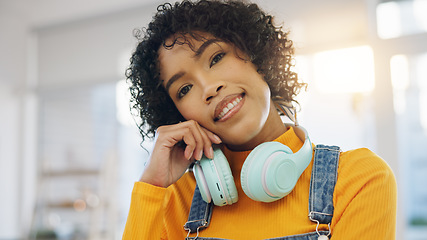 Image showing Face, home and woman with headphones, relax and streaming music with sound, audio and peace. Portrait, happy person or girl in a living room, headset and podcast with casual outfit, comfort and songs