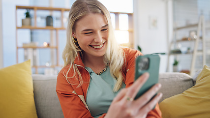 Image showing Woman, smartphone typing and laugh on sofa in home, reading social media and app. Face of happy gen z girl scroll on cellphone for funny meme, download mobile games and search network in living room