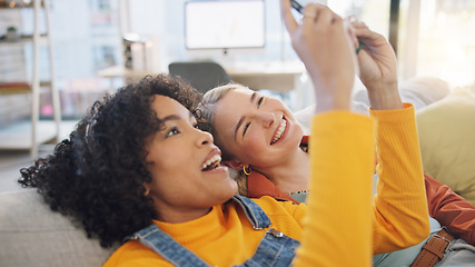 Image showing Girl friends, selfie and living room sofa in home with smile, memory and relax together with social media. Gen z women, students and happy on lounge couch for photography, profile picture or web blog