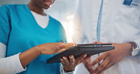 Image showing Doctor, hands and tablet in teamwork, research or healthcare advice together at the hospital. Closeup of medical professional or nurse with technology in team planning, strategy or results at clinic