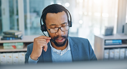 Image showing Computer, call center and support with a black man consultant working in customer service for assistance. Contact, crm and headset communication with an employee consulting in an office for sales