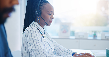 Image showing Black woman, call center and drinking coffee in customer service, support or telemarketing at the office. African female person, consultant or agent enjoying hot beverage in contact us at workplace