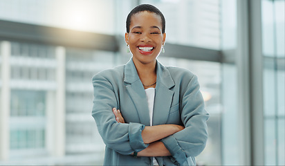 Image showing Portrait, business woman and smile with arms crossed for pride, confidence and working in human resources agency in Nigeria. Happy african employee, HR manager or expert staff in professional company