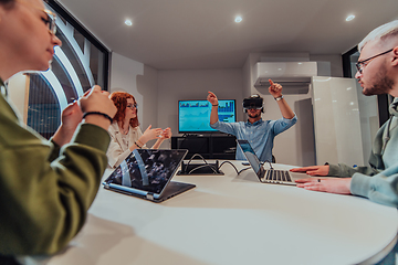 Image showing A diverse group of businessmen collaborates and tests a new virtual reality technology, wearing virtual glasses, showcasing innovation and creativity in their futuristic workspace