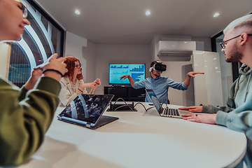 Image showing A diverse group of businessmen collaborates and tests a new virtual reality technology, wearing virtual glasses, showcasing innovation and creativity in their futuristic workspace