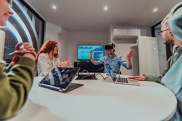 Image showing A diverse group of businessmen collaborates and tests a new virtual reality technology, wearing virtual glasses, showcasing innovation and creativity in their futuristic workspace