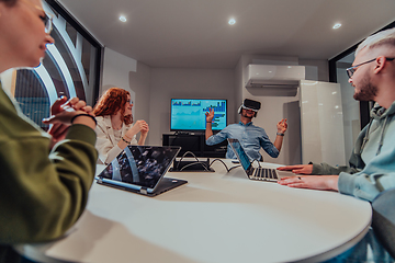 Image showing A diverse group of businessmen collaborates and tests a new virtual reality technology, wearing virtual glasses, showcasing innovation and creativity in their futuristic workspace