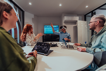 Image showing A diverse group of businessmen collaborates and tests a new virtual reality technology, wearing virtual glasses, showcasing innovation and creativity in their futuristic workspace