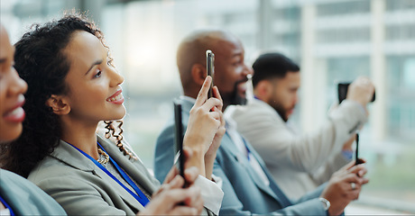 Image showing Reporter, press and office with woman journalist and phone with media staff and live streaming. Tradeshow, seminar audience and employee filming with mobile and meeting at a job working on a event