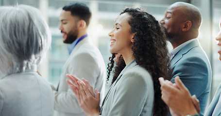 Image showing Celebration, business woman and clapping at a conference with teamwork and motivation in office. Discussion, staff and collaboration with professional team at a seminar with workforce and achievement