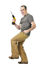 Image showing Handyman with a drill and wire cutters