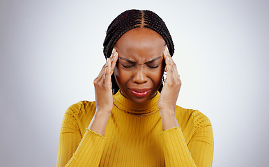Image showing Stress, pain and black woman with a headache, frustrated and tension on a white studio background. African person, girl and model with a migraine, depression and strain with mind fatigue or emergency