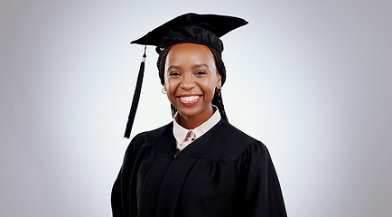 Image showing Graduate, black woman and portrait with smile from college and academy achievement in studio. Happy, university student and school success with white background and African female person with study