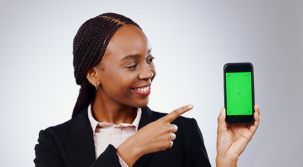 Image showing Business woman, phone green screen and mockup for presentation, marketing or sign up information in studio. Professional african worker on mobile app for job news or opportunity on a white background