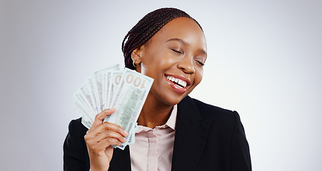 Image showing Business woman, winner and money fan for success, bonus and winning in a competition, loan or cashback in studio. Happy african worker with cash dream, reward or financial savings on white background